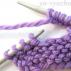 Vertical buttonholes for knitting needles